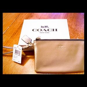 Coach Champagne Metallic Leather Wristlet